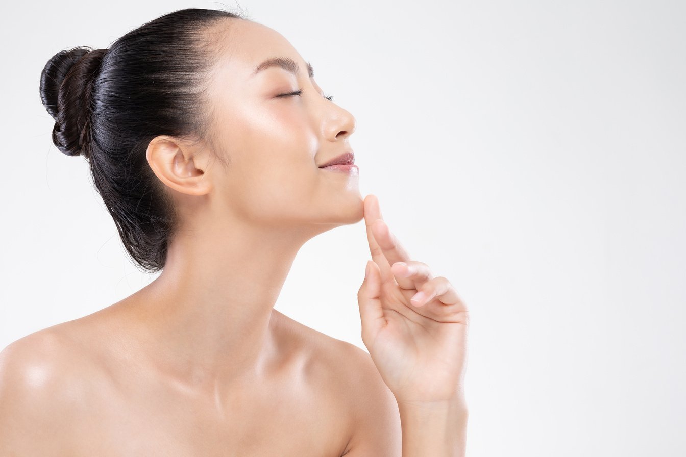 Beauty Asian Woman Touch Chin with Plastic Surgery chin